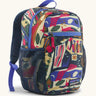 Patagonia 15 litres kids refugito day pack backpack in a let's chat pattern with new navy colour. Zipped main compartment with zipped front pocket and two mesh side pocket bottle holders on the sides. 