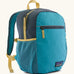 Patagonia kids 15 litre refugito day pack backpack in mako blue. Large zipped compartment with front zipped pocket and mesh side panel bottle holders.