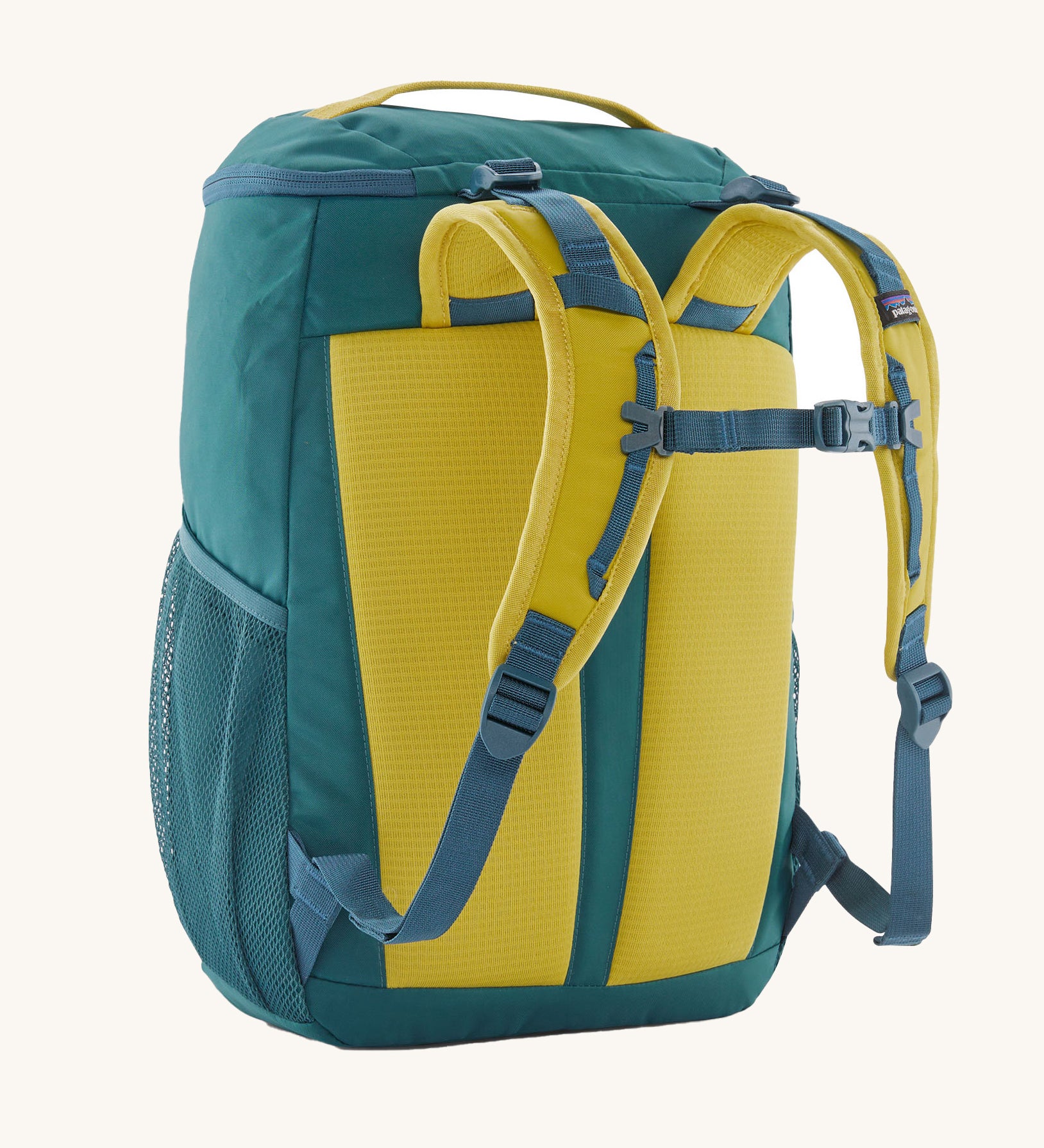 The back of a Patagonia Kids Refugito Day Pack 18L in Wetland Blue on a plain background.