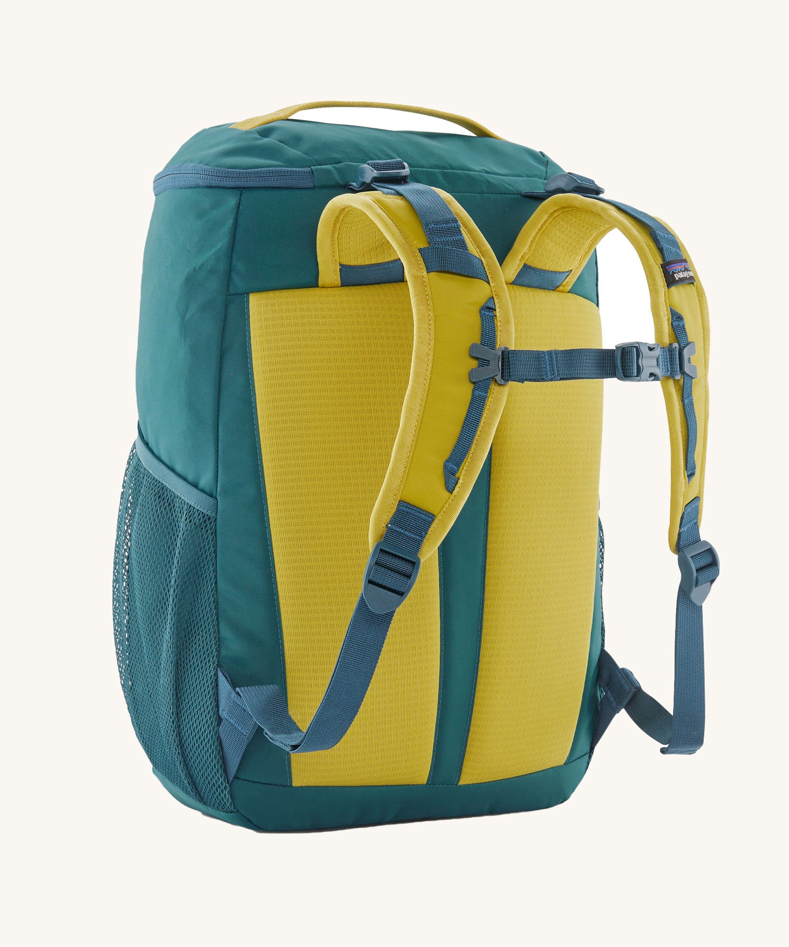 The back of a Patagonia Kids Refugito Day Pack 18L in Wetland Blue on a plain background.