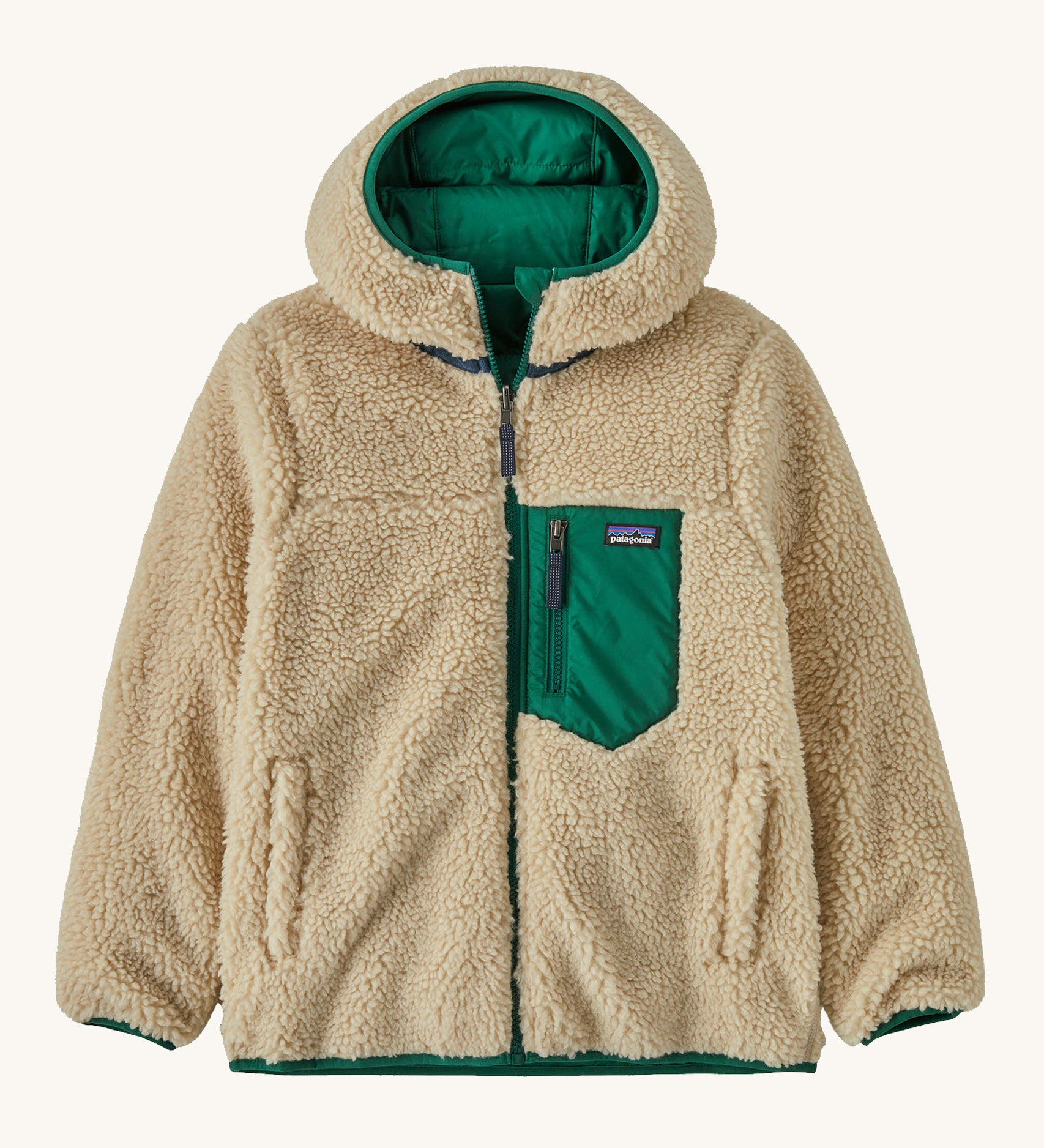Patagonia Kids Reversible Ready Freddy Hoody in a Conifer Green showing the fleecy side on the jacket on a plain background.
