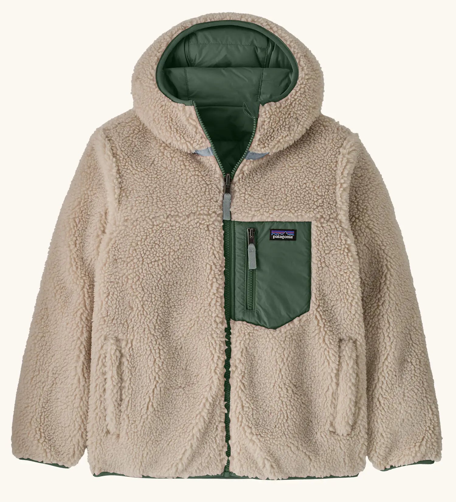 Patagonia kids reversible ready freddy hoody in canopy green shown on the fleece side with green zipped chest pocket.