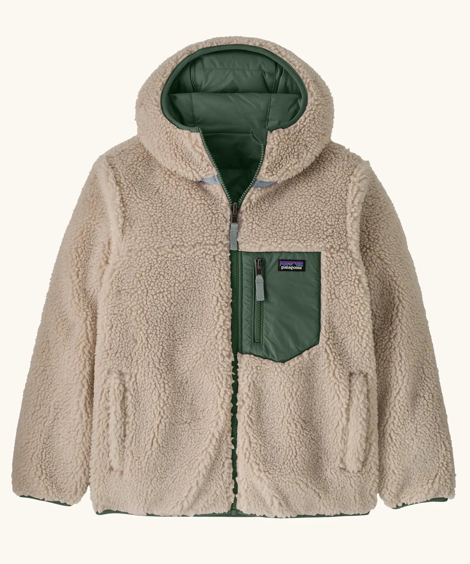 Patagonia kids reversible ready freddy hoody in canopy green shown on the fleece side with green zipped chest pocket.