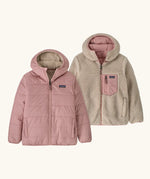 Patagonia kids reversible ready freddy hoody water resistant jacket in fuzzy mauve. Shown on both sides, pink fuzz mauve and cream fleece side with pink zipped chest pocket.