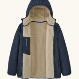 Patagonia kids reversible ready freddy hoody water resistant jacket in new navy. Front open showing cream fleece inside and navy zipped pocket.