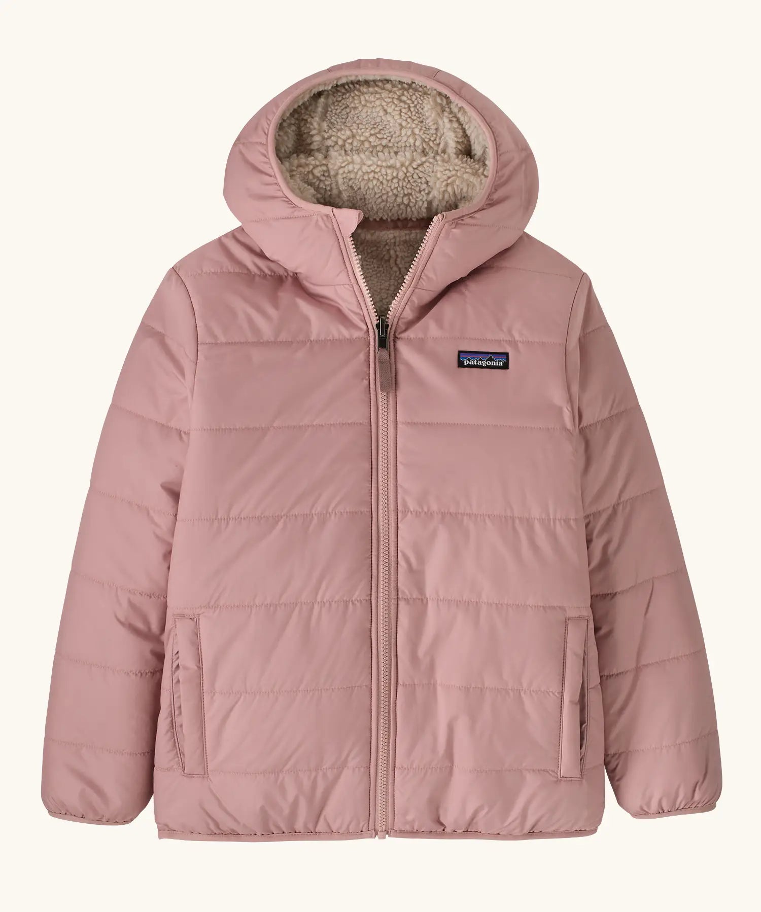 Patagonia kids reversible ready freddy hoody water resistant jacket in fuzzy mauve pink with small black logo on chest.