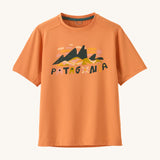 Patagonia kids short sleeve cap tshirt in a peach colour with logo on a cream background.
