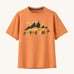 Patagonia kids short sleeve cap tshirt in a peach colour with logo on a cream background.