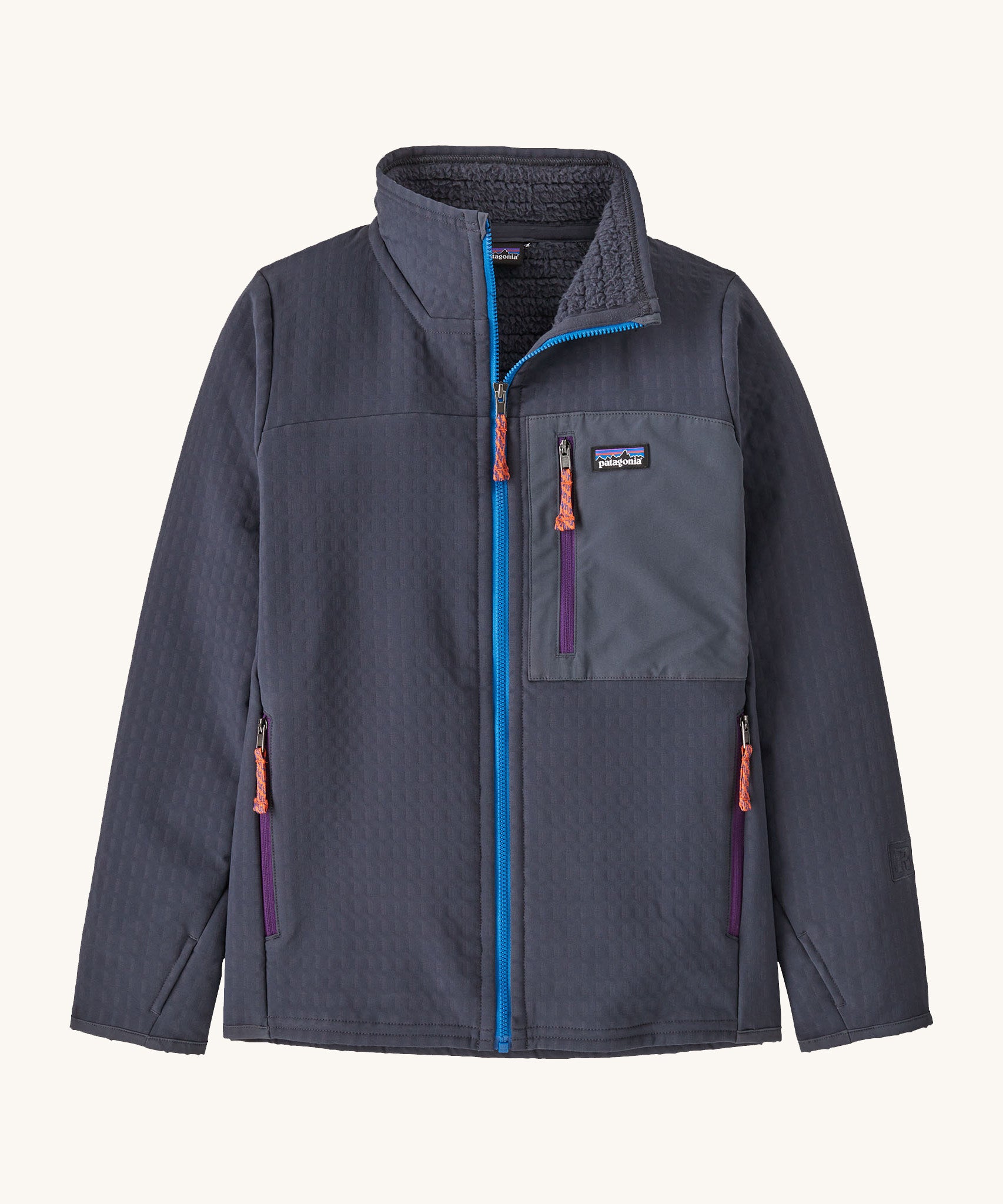 Patagonia kids techface jacket in smolder blue. A technical style jacket with blue zip detail, a chest pocket with the logo patch stitched on and 2 side pockets