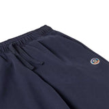 A close up of the waistband on the Patagonia Kids Sweatpants in a Fitz Roy Icon New Navy colour way.