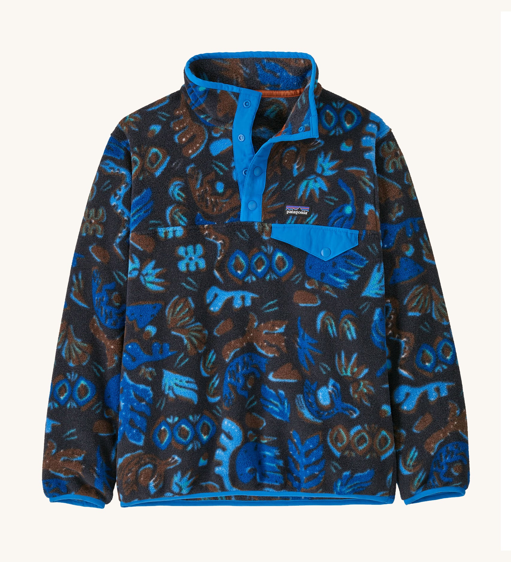Patagonia Kids Synch Snap-T in a blue Oceans pattern on a plain background.