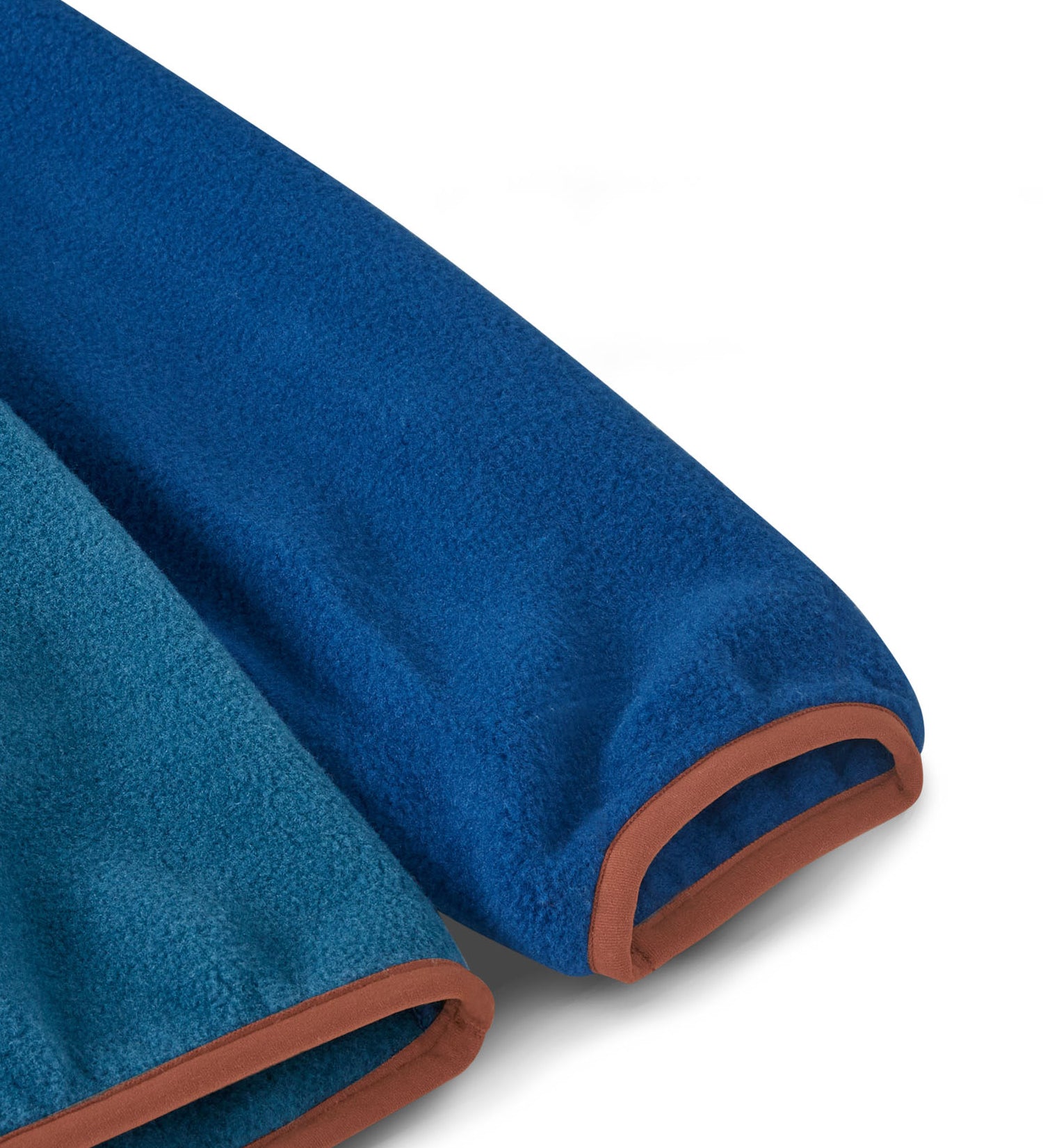 A close up of a Patagonia kids synchilla fleece showing the soft elasticated cuff detail.