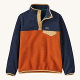 Patagonia Kids Synchchilla Snap-T pull over top in a  Redtail Rust colour way on a plain background. 