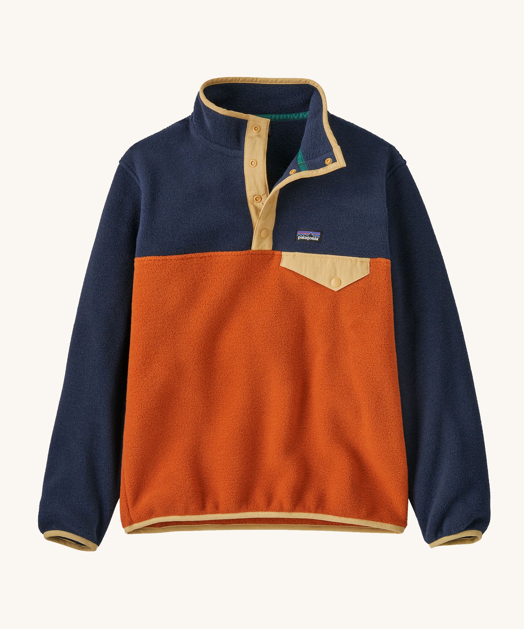 Patagonia Kids Synchchilla Snap-T pull over top in a  Redtail Rust colour way on a plain background. 