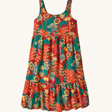 Patagonia kid's tidal threads sleeveless dress in hot ember orange with a leafy themed tropiclimb print all over. 