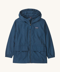 Patagonia kids outdoor everyday jacket in a dark blue colour on a cream background.