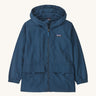 Patagonia kids outdoor everyday jacket in a dark blue colour on a cream background.