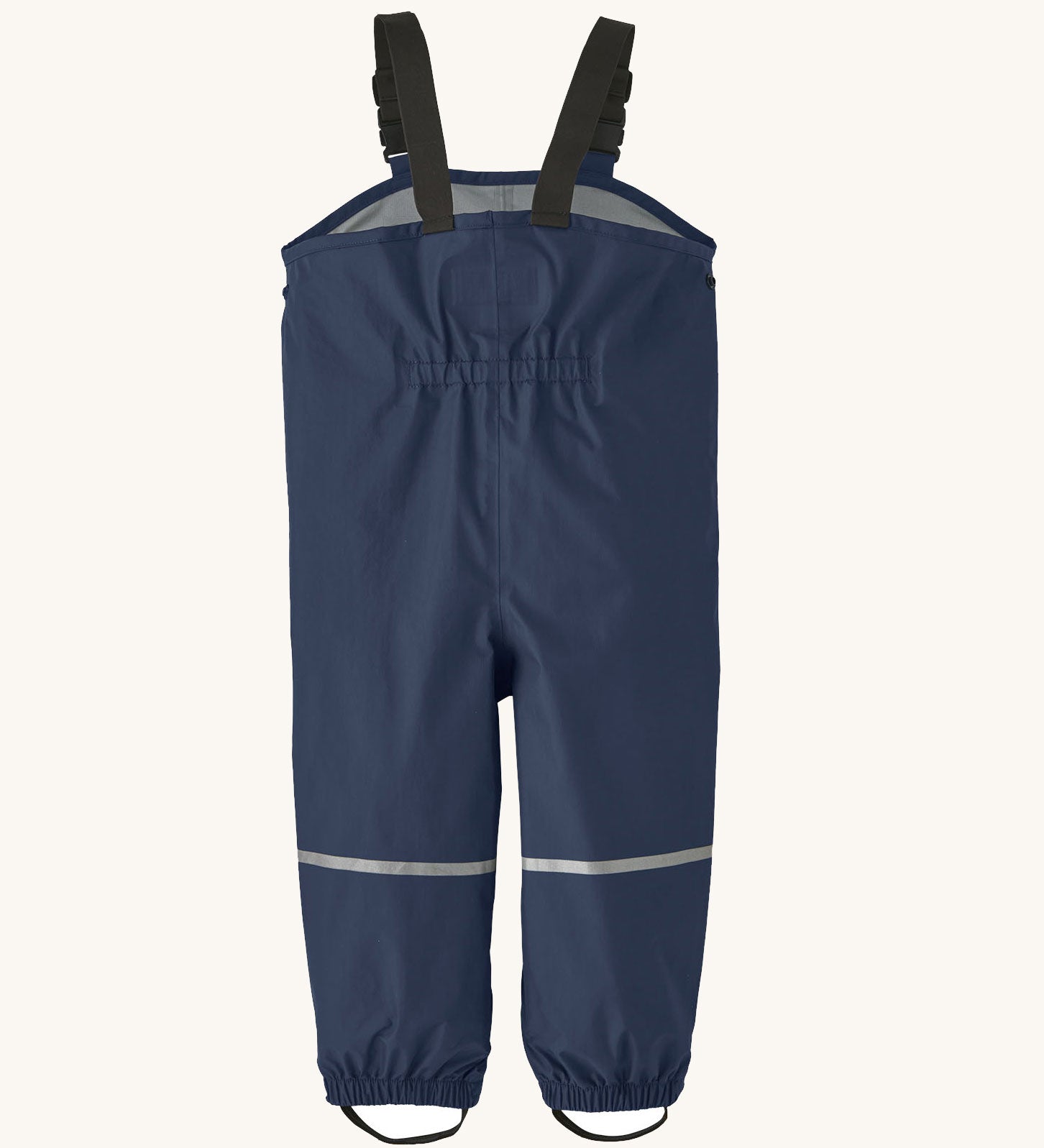 The back of the Patagonia Little Kids Torrentshell 3L Rain Bibs in a New Navy colour on a plain background.