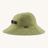The Patagonia Kid's Trim Brim Sun Hat in green. Showing air holes on the side panel and elasticated size adjust strap
