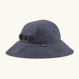 Patagonia kids recycled nylon wide brim sun hat in navy showing air holes on the side and elasticated size strap on the back