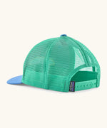 Patagonia kid's trucker hat in blue with  turquoise mesh on the back. Showing adjustable size strap