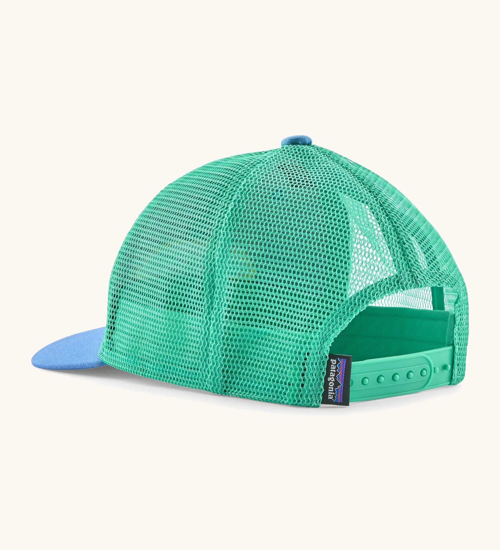 Patagonia kid's trucker hat in blue with  turquoise mesh on the back. Showing adjustable size strap