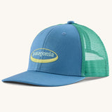 Patagonia kid's trucker hat with 95 oval logo in shore blue with green netting on the back
