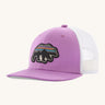 Patagonia kids trucker hat in back for good bear/ brisk purple. Showing the vibrant purple front panel and matching bill, white mesh on the back. Features a brand patch on the front panel in a shape of a bear