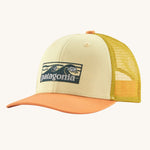 The Patagonia Kids Trucker Hat Baseball Cap with a Boardshort Logo Tones and Buttercup Yellow colour on a plain background. 