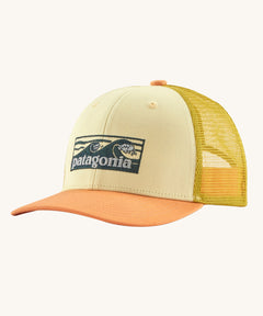 The Patagonia Kids Trucker Hat Baseball Cap with a Boardshort Logo Tones and Buttercup Yellow colour on a plain background. 