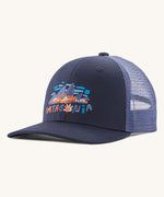 Patagonia kids trucker hat in fitz Roy foliage / new navy. Showing the navy blue  front panel and matching bill, pastel blue mesh on the back  Features a brand patch on the front panel.