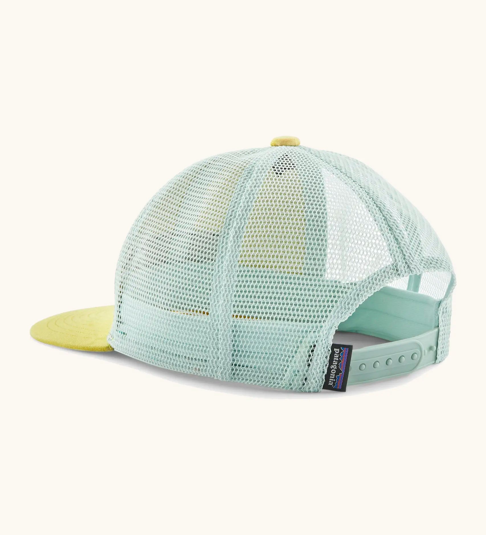 Patagonia kid's trucker hat in lemon zest yellow showing mind green mesh back panel and size adjustment strap