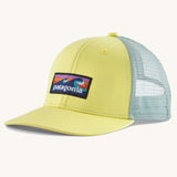 Patagonia kid's trucker hat in lemon zest yellow with boardshort logo on the front and mint green netting on the back. 