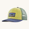 Patagonia kids trucker hat in nearly green Showing the pale green front panel, pastel green mesh on the back and a blue bill. Features a brand patch on the front panel.