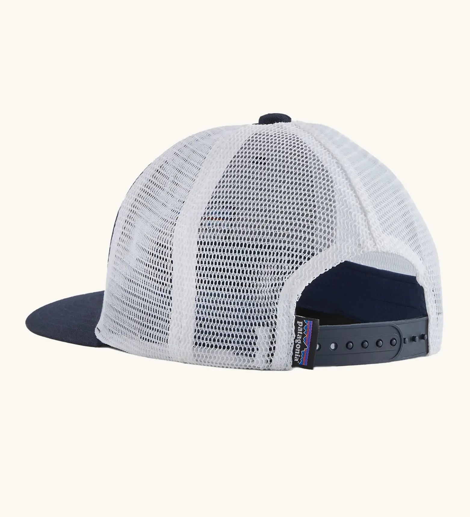 Patagonia Kids P6 logo baseball cap in navy with a white mesh back panel. Showing adjustable size strap on the back
