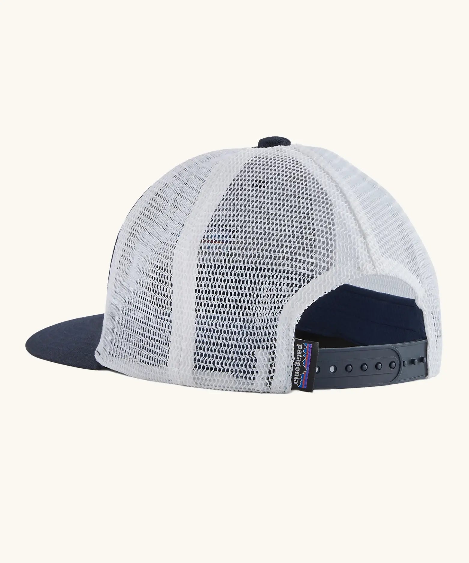Patagonia Kids P6 logo baseball cap in navy with a white mesh back panel. Showing adjustable size strap on the back