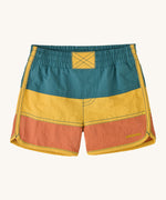 Patagonia kids swim shorts in blue yellow and orange colour block on a cream background