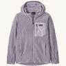 Patagonia kids full zip hoodie in a pastel purple colour on a cream background
