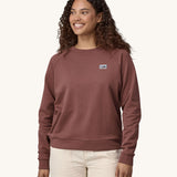 A woman wearing the Patagonia Women's Regenerative Cotton Essential Top in a Dulse Mauve colour.