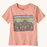 The Patagonia Little Kids Regenerative Fitz Roy Skies T-Shirt in a Sunlit Pink colour way on a plain background.