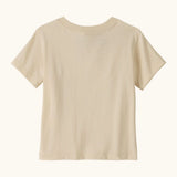 Back of Patagonia's Little Kids Regenerative Fitz Roy Skies T-Shirt in a Undyed Natural colour 