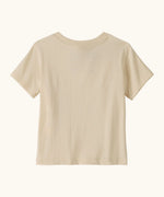 Back of Patagonia's Little Kids Regenerative Fitz Roy Skies T-Shirt in a Undyed Natural colour 