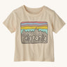 The Patagonia Little Kids Regenerative Fitz Roy Skies T-Shirt in a Undyed Natural colour way on a plain background. 
