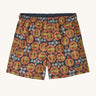 The Patagonia Little Kids Baggies Shorts with a Bee You / New Navy design on a plain background.