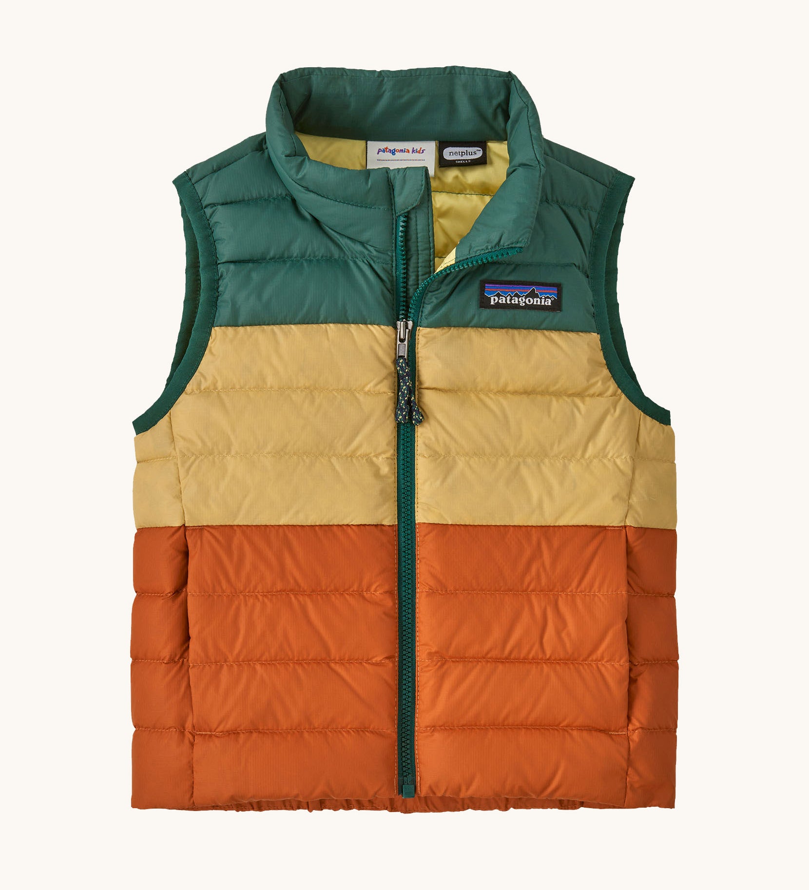 Patagonia kids colour block gilet in conifer green.