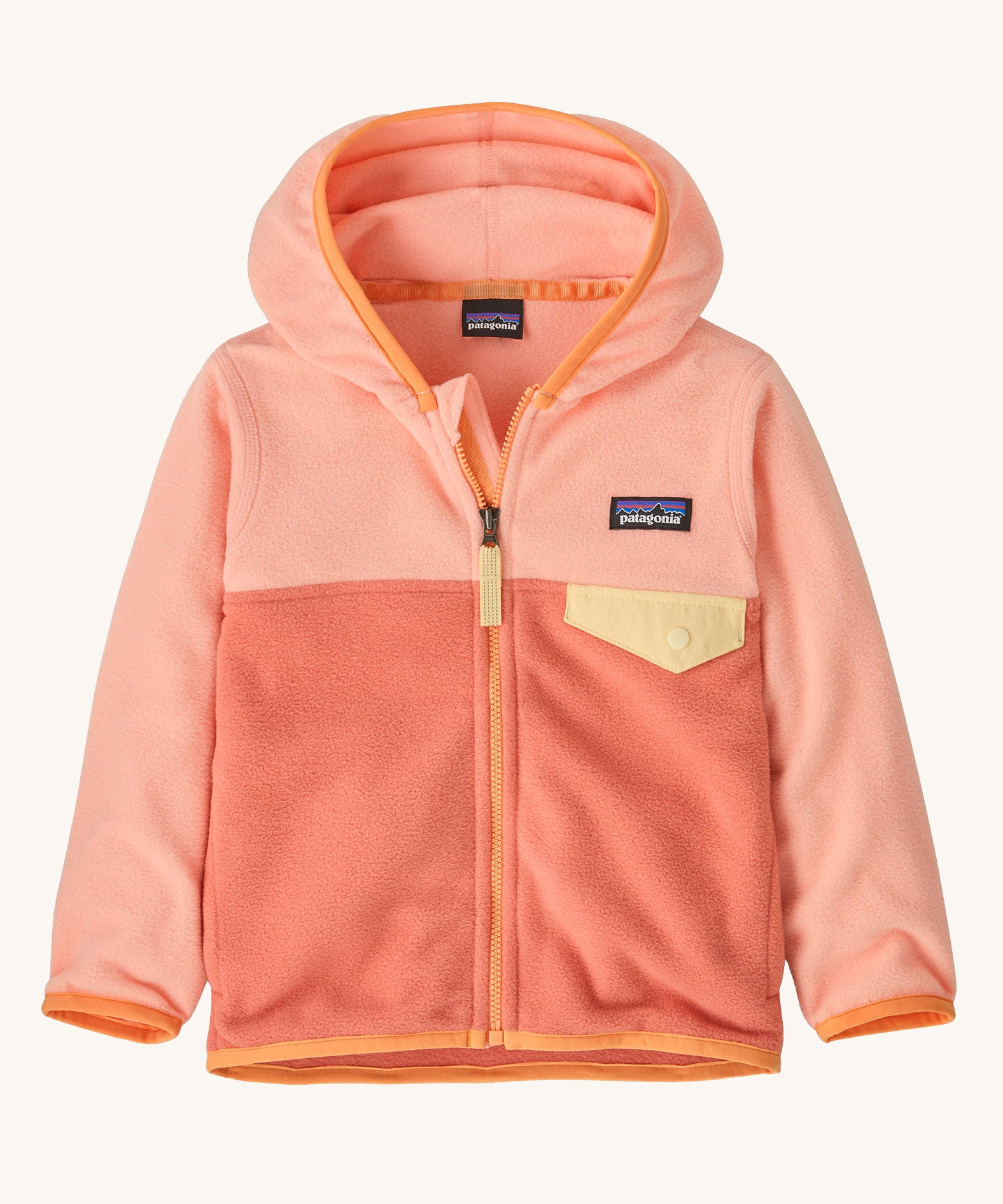A Patagonia Little Kids Micro D Snap-T Jacket in a Peak Pink colour way on a plain background. 