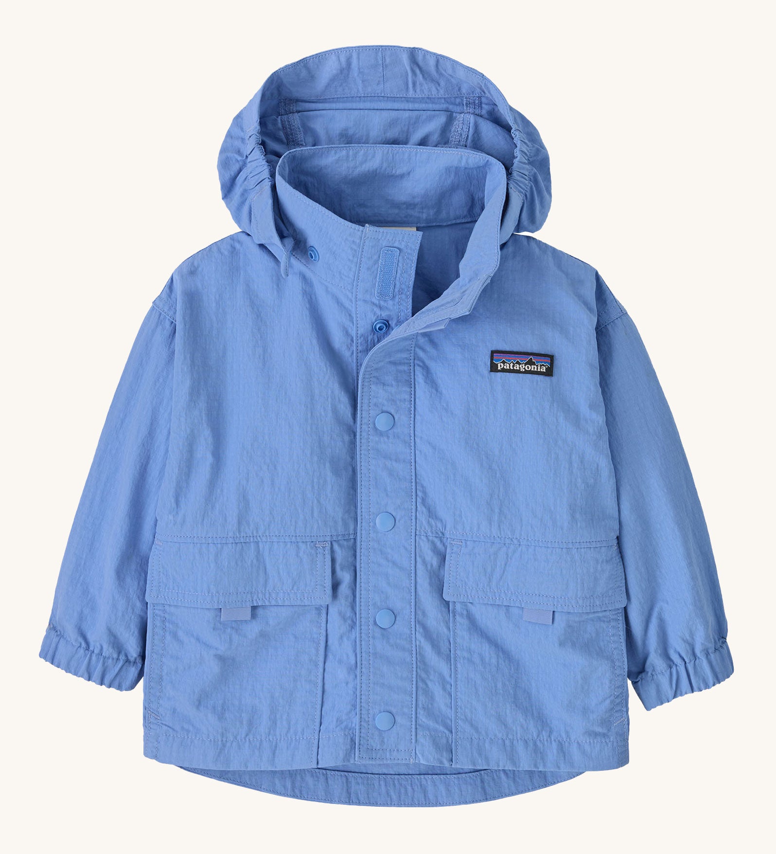 The Patagonia Little Kids Outdoor Everyday Jacket in the Abundant Blue colour way on a plain background. 
