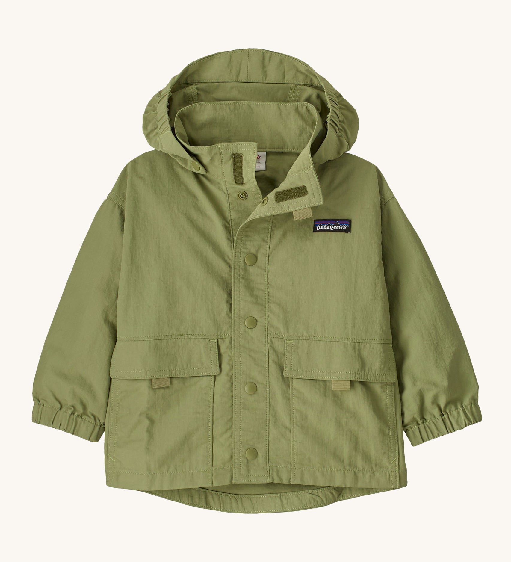 The Patagonia Little Kids Outdoor Everyday Jacket in the Buckhorn Green colour way on a plain background. 