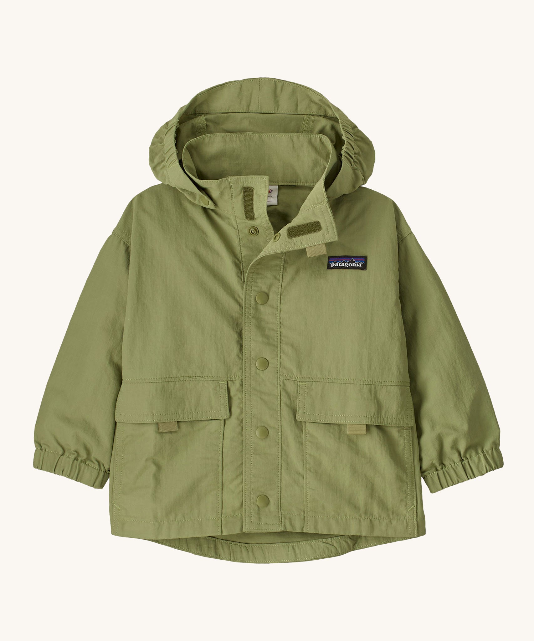 The Patagonia Little Kids Outdoor Everyday Jacket in the Buckhorn Green colour way on a plain background. 