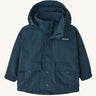 The Patagonia Little Kids Outdoor Everyday hooded Jacket in dark blue. Showing full length popper and velcro fasteners and front velcro pockets